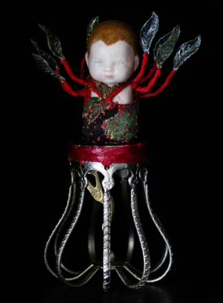 Handmade deity statue from thrifted items